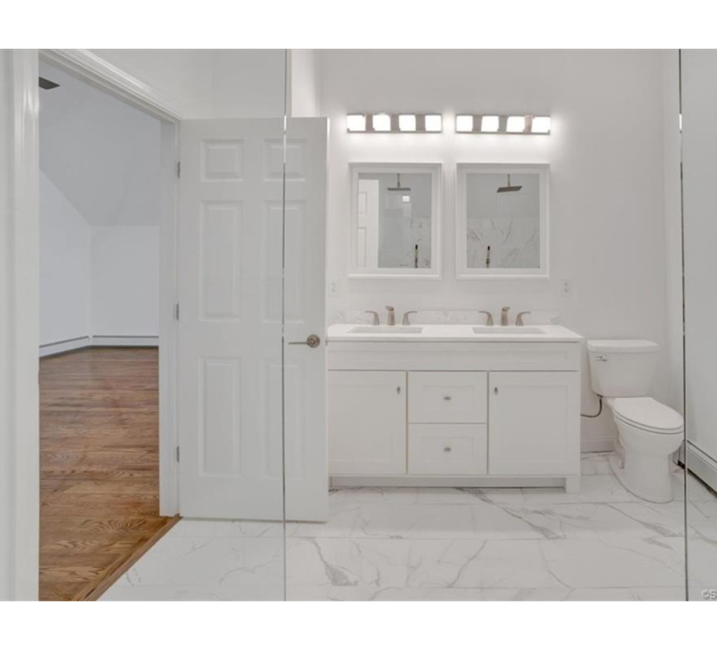 Pure Elegance: All-White Bathroom Remodel with Marble & Silver Touches