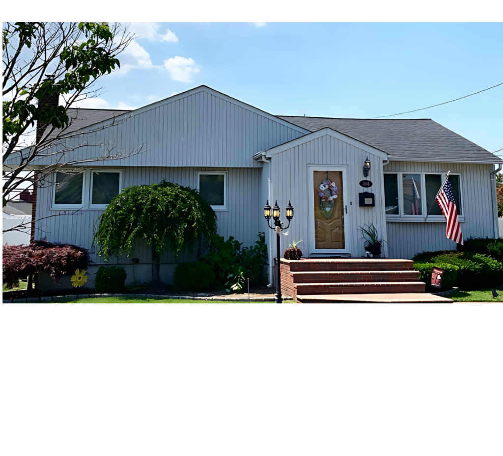 Cozy Curb Appeal: Blue-Gray Exterior, Brick Landing & Classic Brown Roof