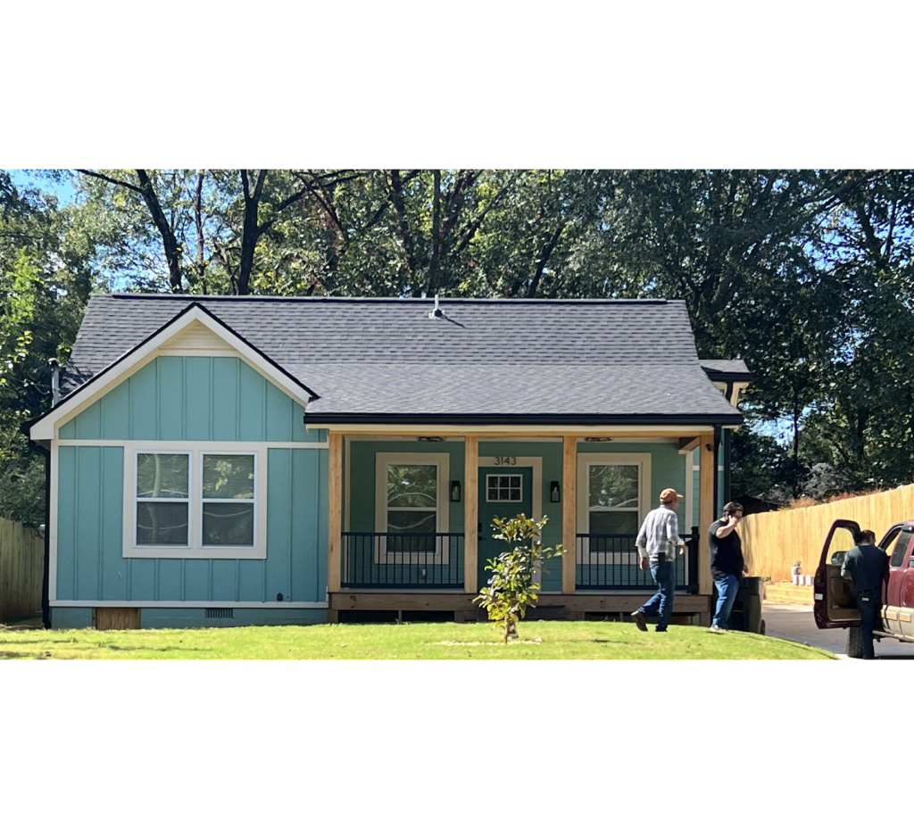 Soft Meets Strong: Light Blue Exterior with a Bold Black Roof for Striking Street Presence
