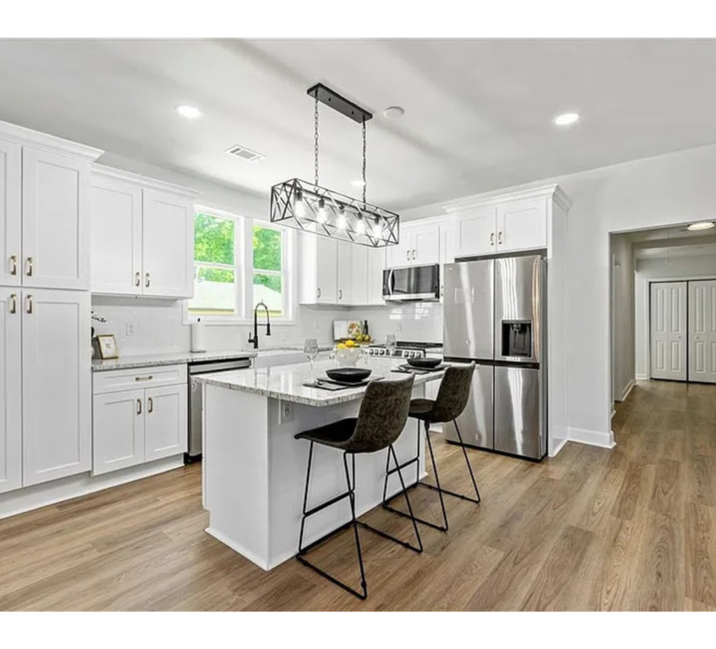 Golden Touch: White Cabinets, Marble Countertops & Stainless Style Shine in This Luxe