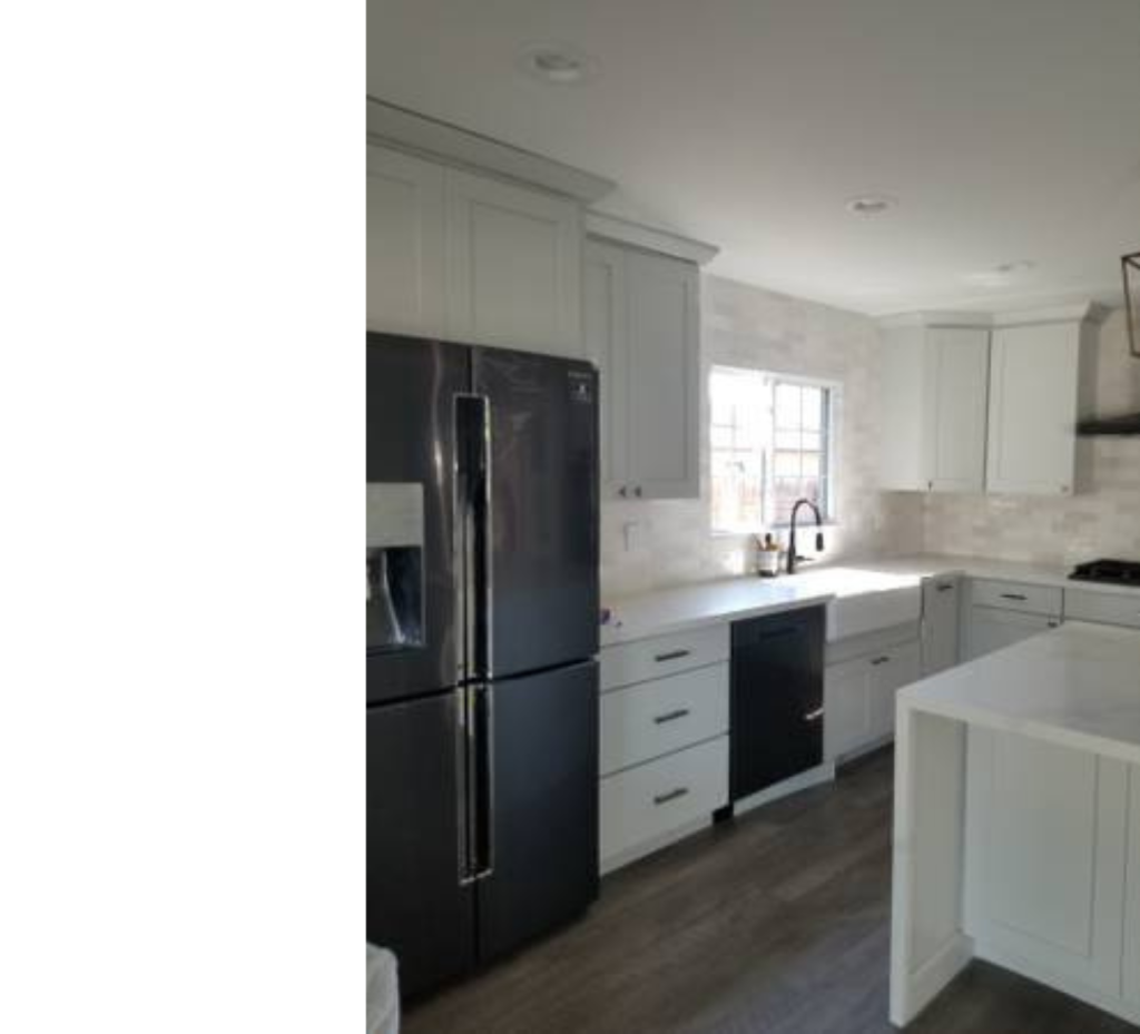 Sleek Simplicity: White Finishes, Warm Wood Floors & Bold Black Appliances for a Chic, Clean Kitchen