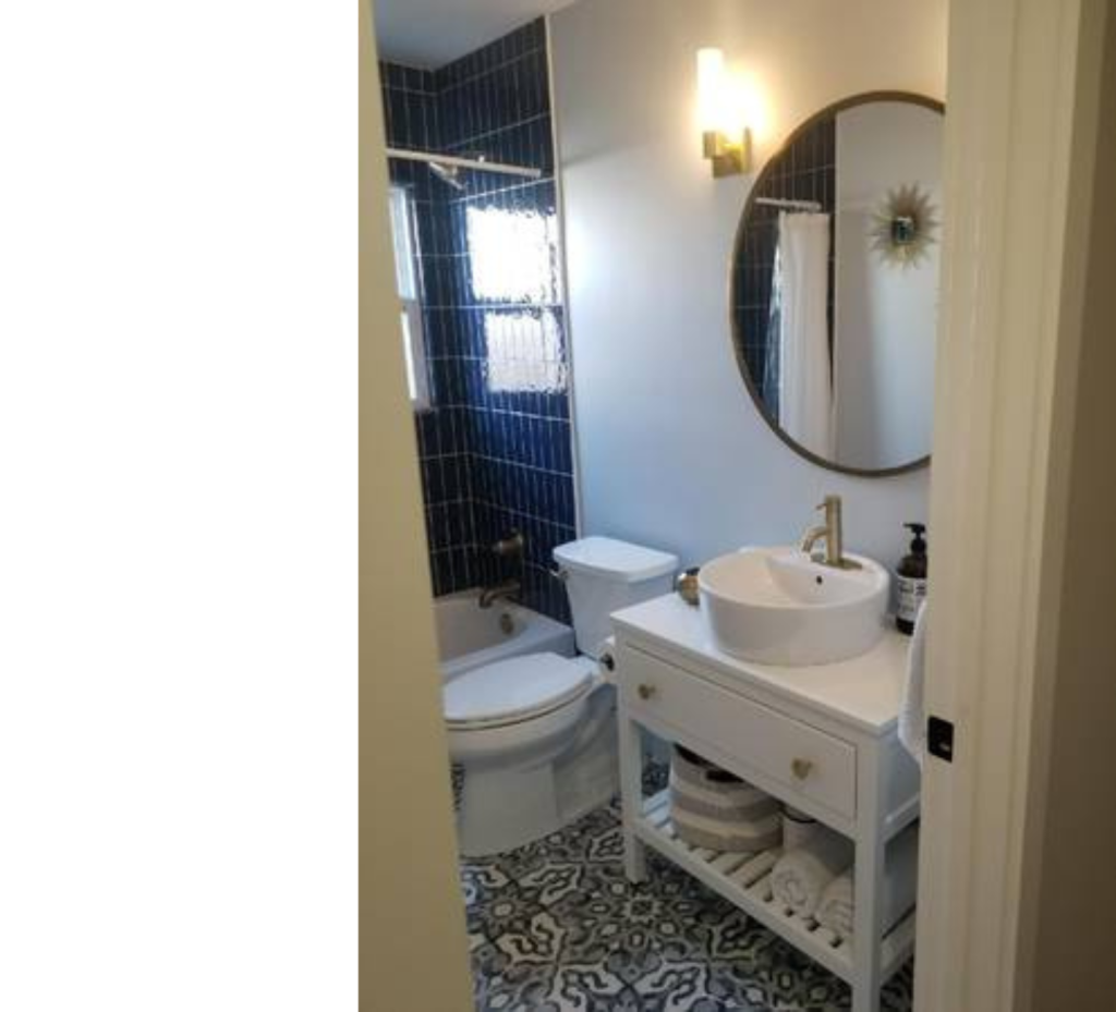 Bold Meets Bright: Navy Shower Tiles, White Finishes & Luxe Gold Touches for a Striking Bathroom Look