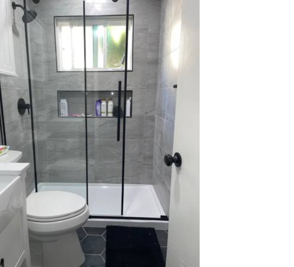 Modern Contrast: Gray Walls, Glass Shower, Black Hardware & Clean White Accents