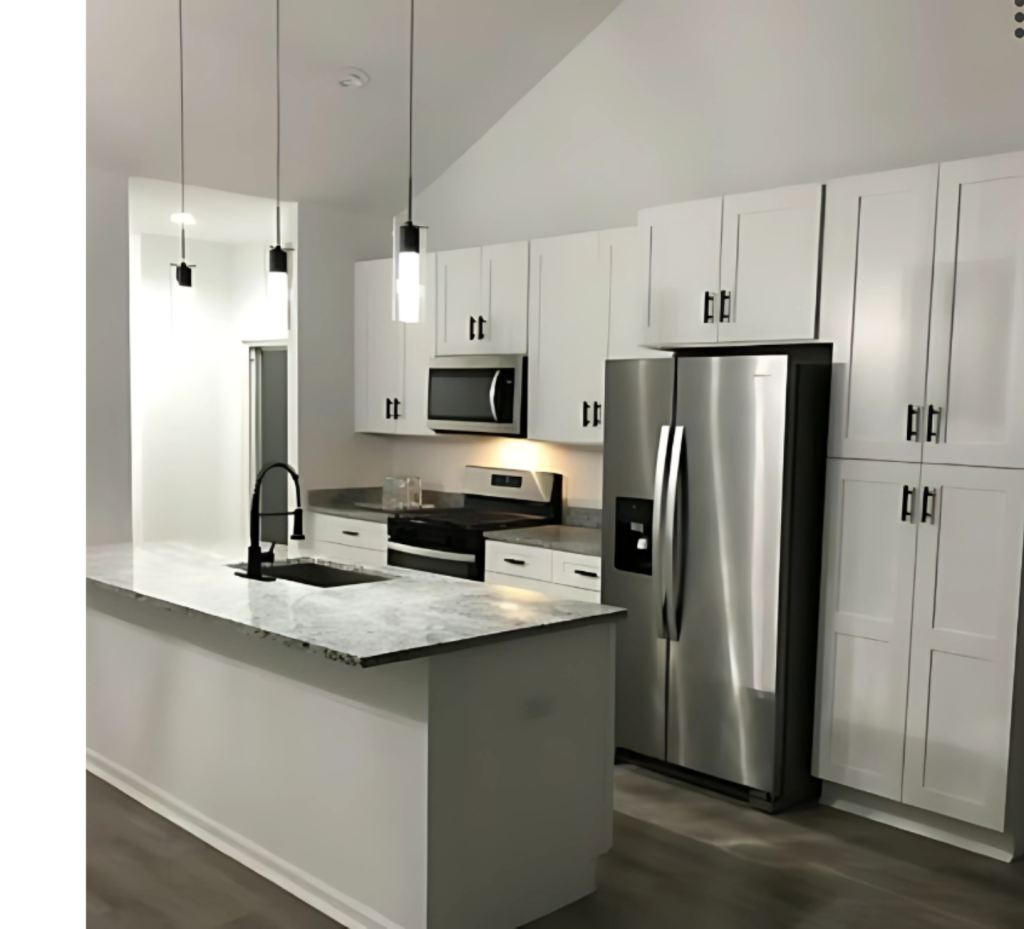 Timeless Kitchen Design with Crisp White Cabinets and Bold Black Hardware