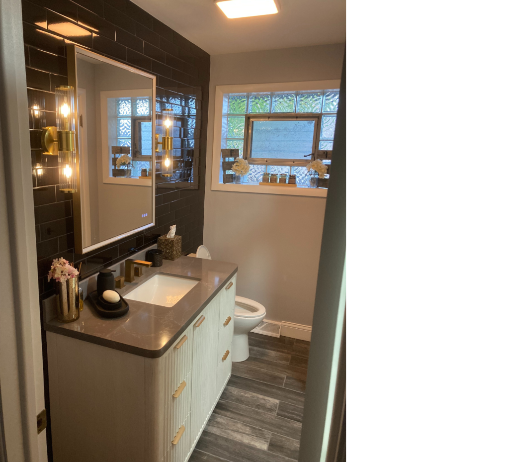 Sleek & Modern Bathroom with Bold Black Wall Tiles and Elegant White-Gray Accents