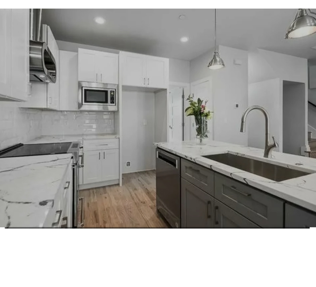 Sleek Contrast: Gray Cabinets & Marble Veins
