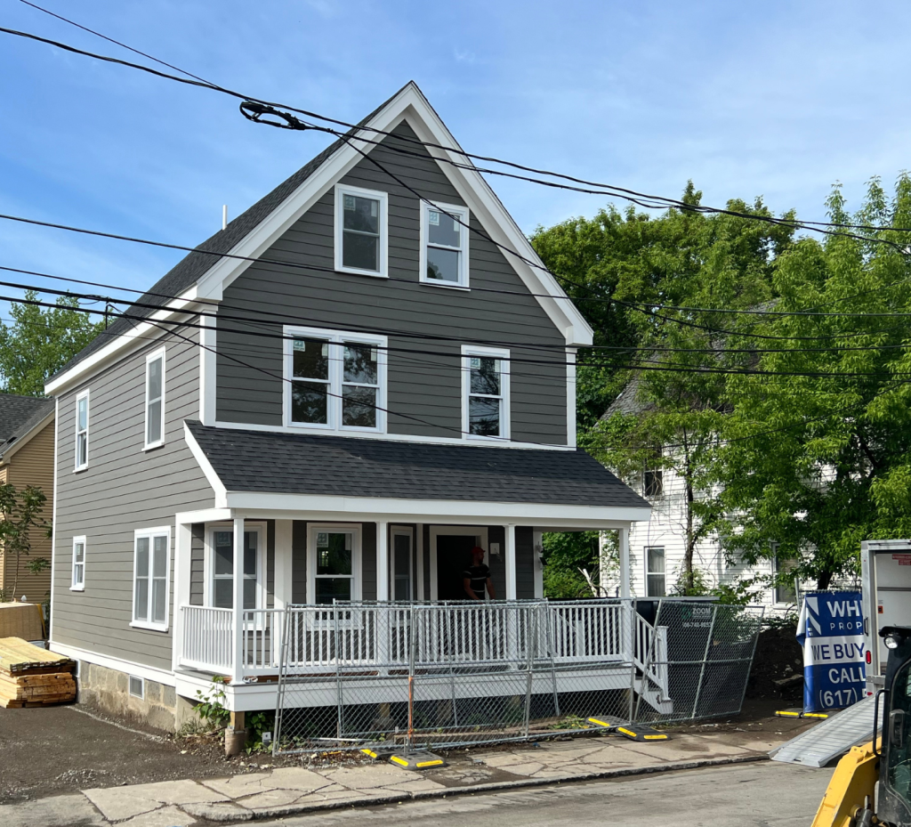 Modern Gable Charm: A Study in Gray and White