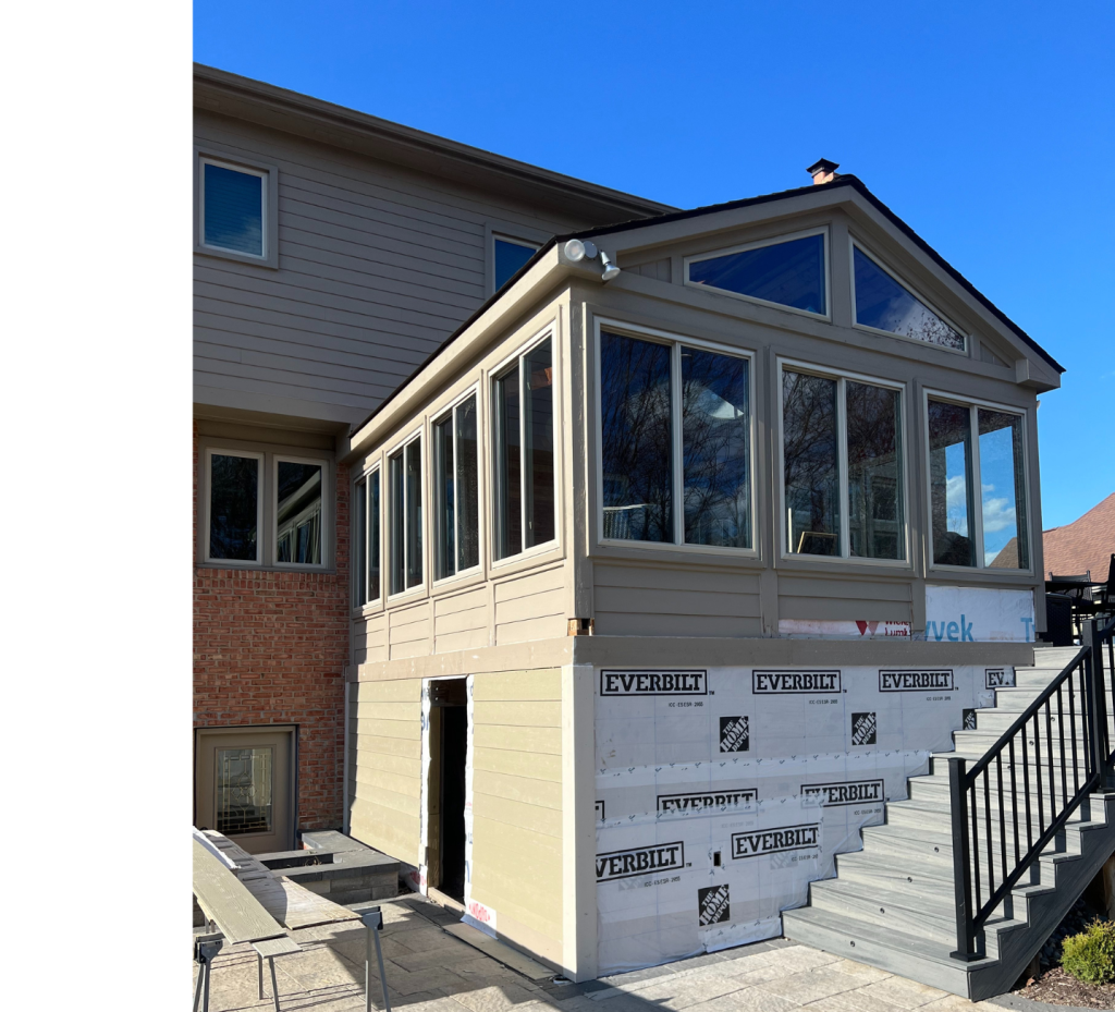 Bright Sunroom Addition: Connecting Indoors & Outdoors