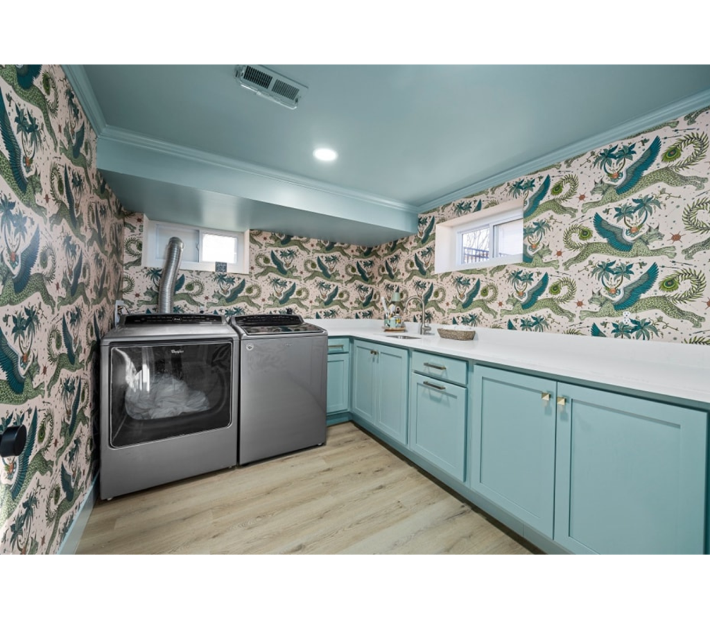 Whimsical Wallpaper & Serene Blues: A Cheerful Laundry Space