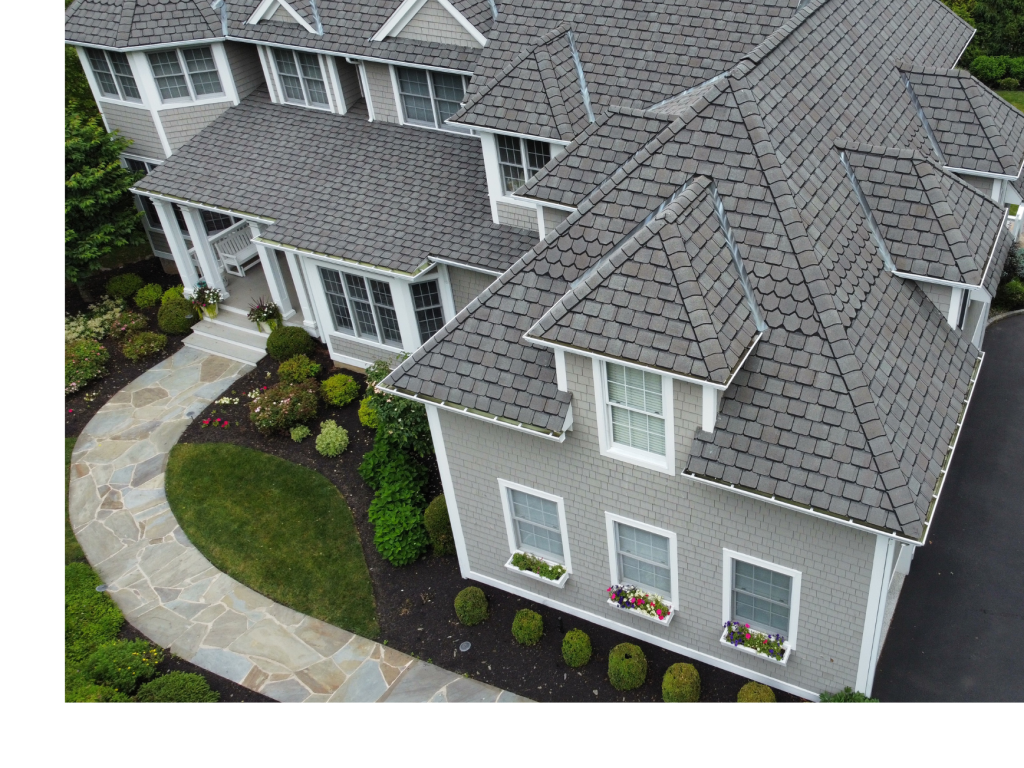 Grand Manor Majesty: A Luxurious Home Under Slate-Style Roofing