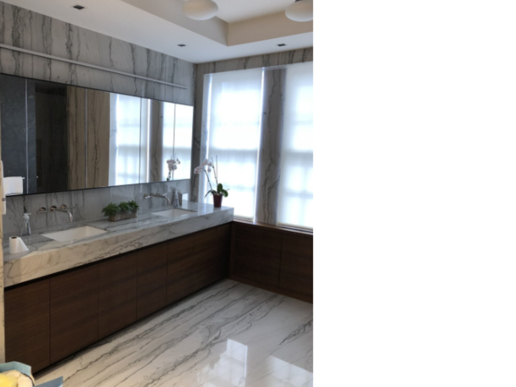 Textured Tranquility: Wood and Veined Marble Bathroom