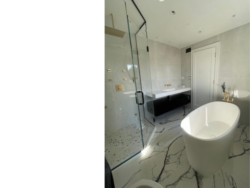 Modern Marble Retreat: Glass Shower & Freestanding Tub