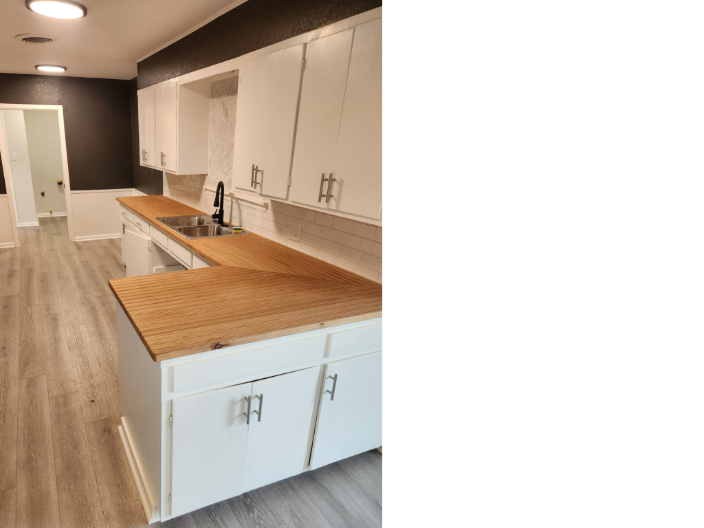 Warm Wood Accent: White Cabinets & Cherry Counter