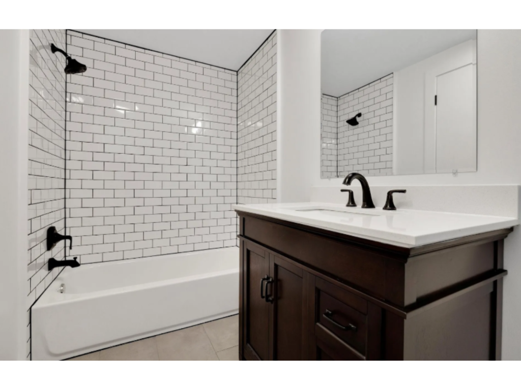 Classic Contrast: Foremost Naples Vanity in a White & Black Bath
