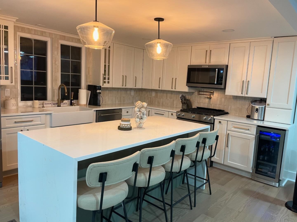 Bright Waterfall Island: Off-White Kitchen Gathering Space