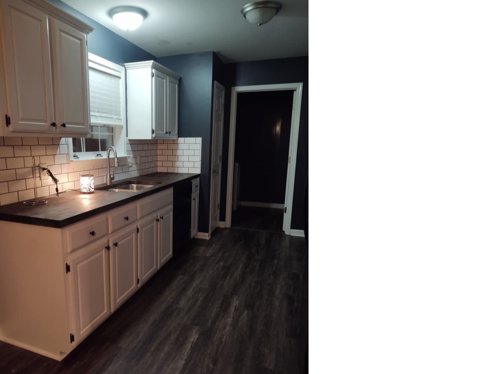 Cozy White Kitchen: Dark Counter Contrast
