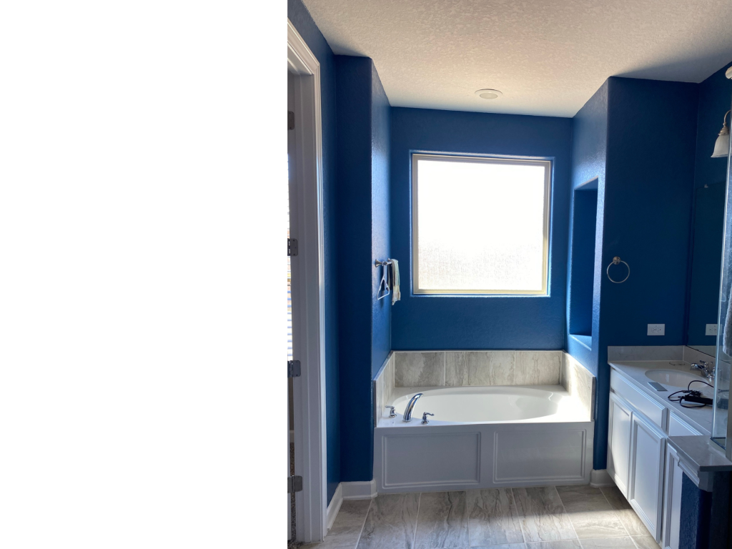 Bold Blue Oasis: Serene Bath with Natural Light