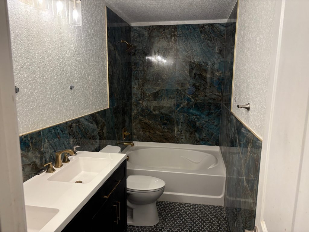 Moody Elegance: Deep Teal & Gold Bathroom Retreat