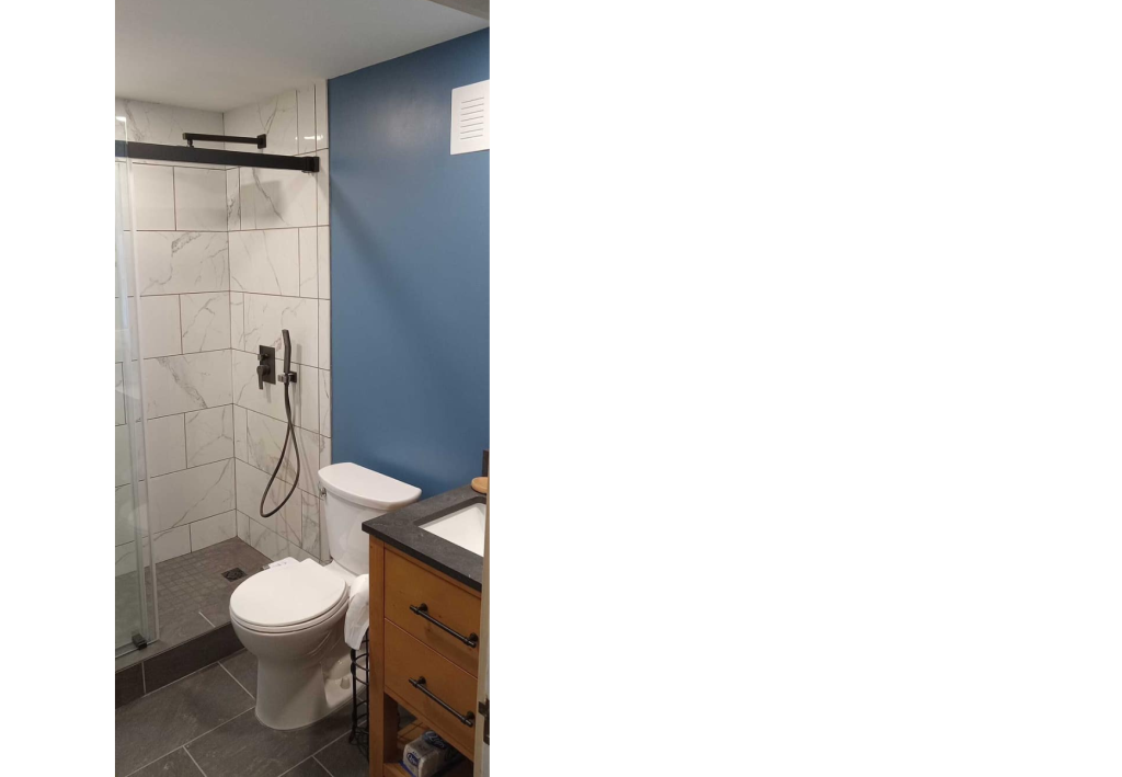 Bold & Bright: A Modern Bathroom with Striking Blue Wall Accent