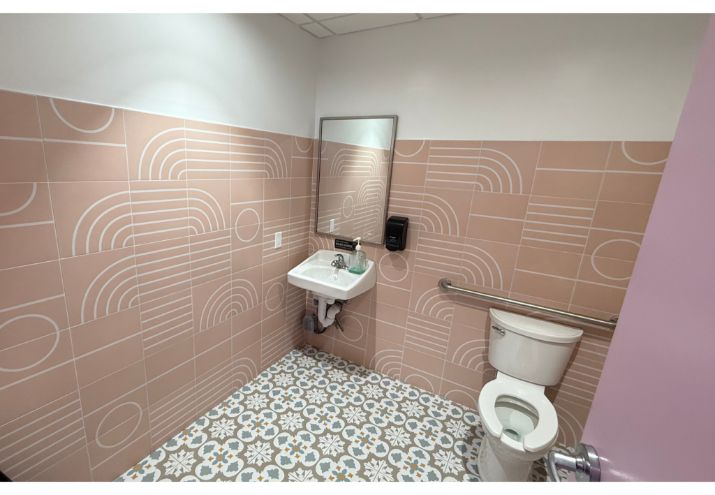 Chic & Accessible: Modern Commercial Restroom with Stylish Tilework
